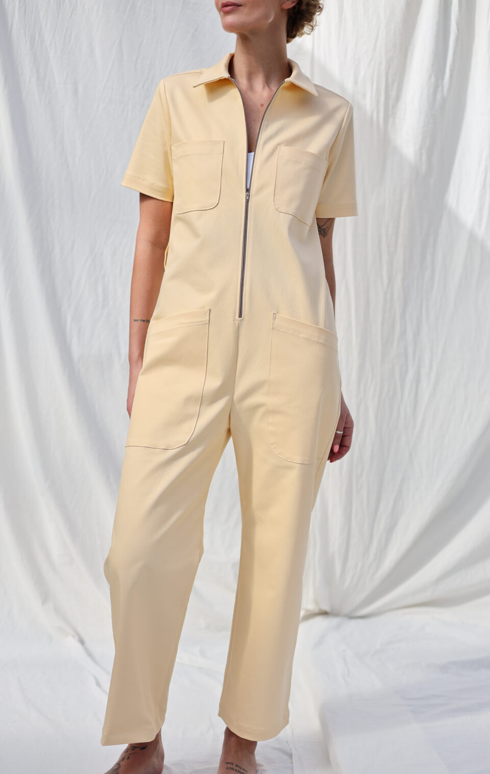 Pale yellow short sleeve jumpsuit with patch pockets MAJA | Jumpsuit | Sustainable clothing | OffOn clothing