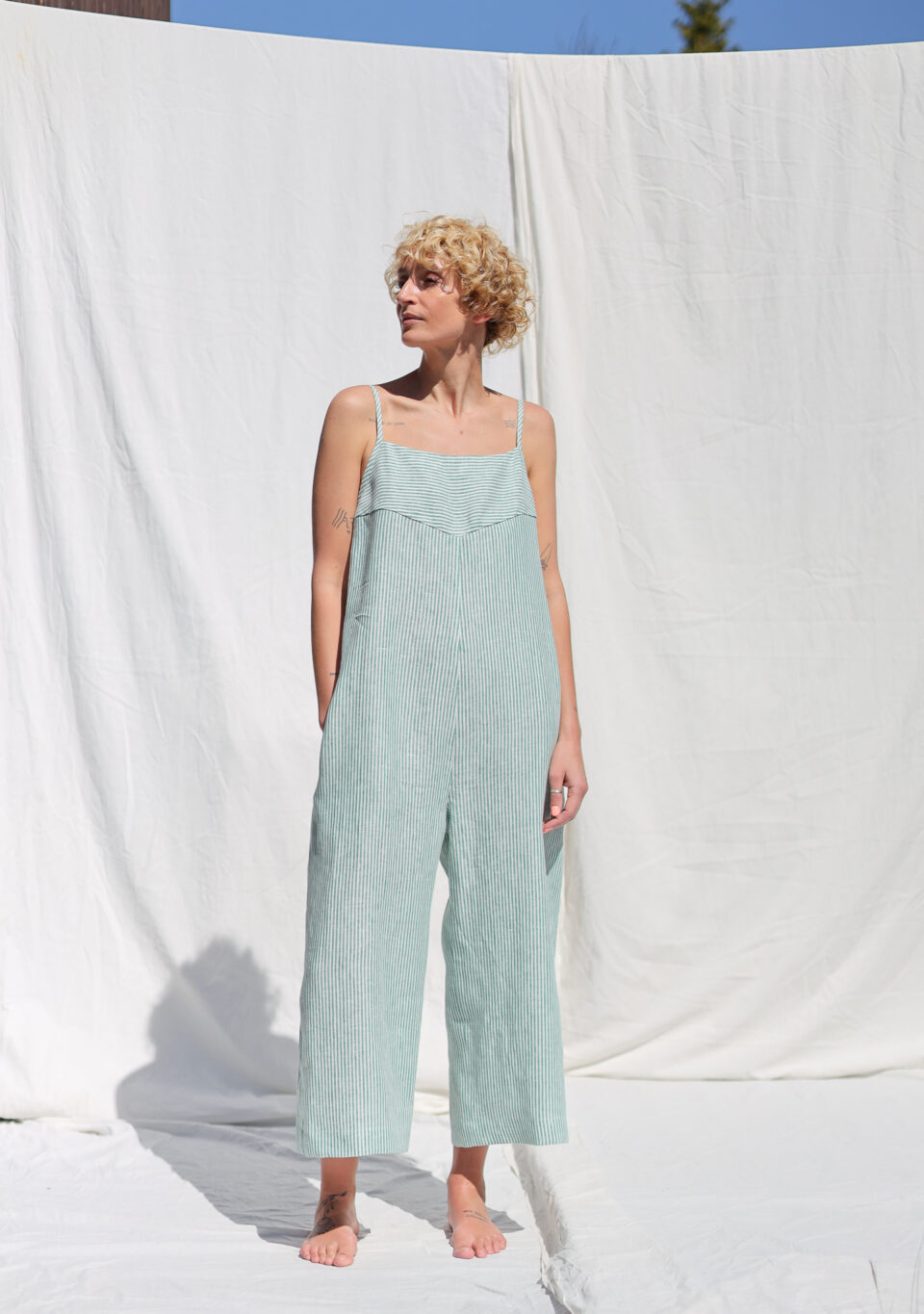 Loose spaghetti strap linen jumpsuit in green stripes ADA | Jumpsuit | Sustainable clothing | OffOn clothing