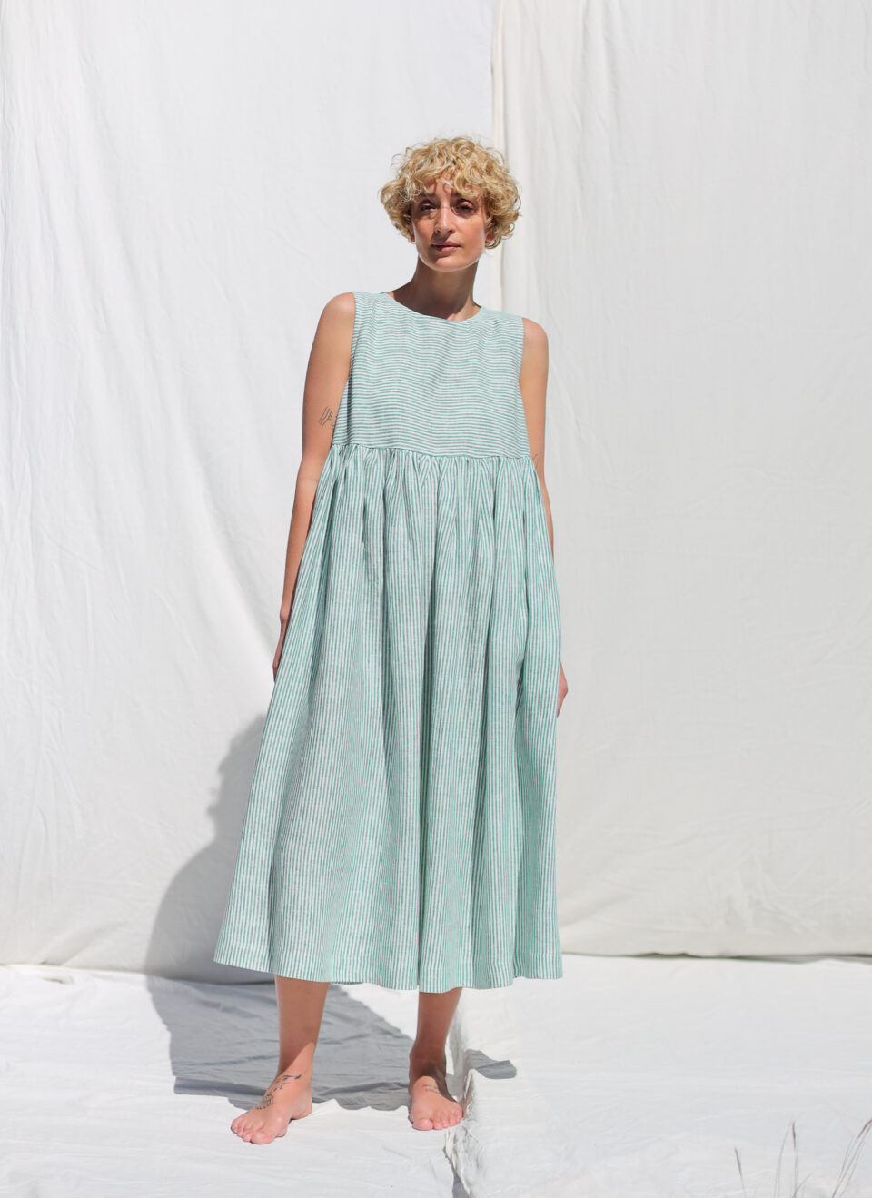 Sleeveless linen smock dress in green stripes | Dress | Sustainable clothing | OffOn clothing