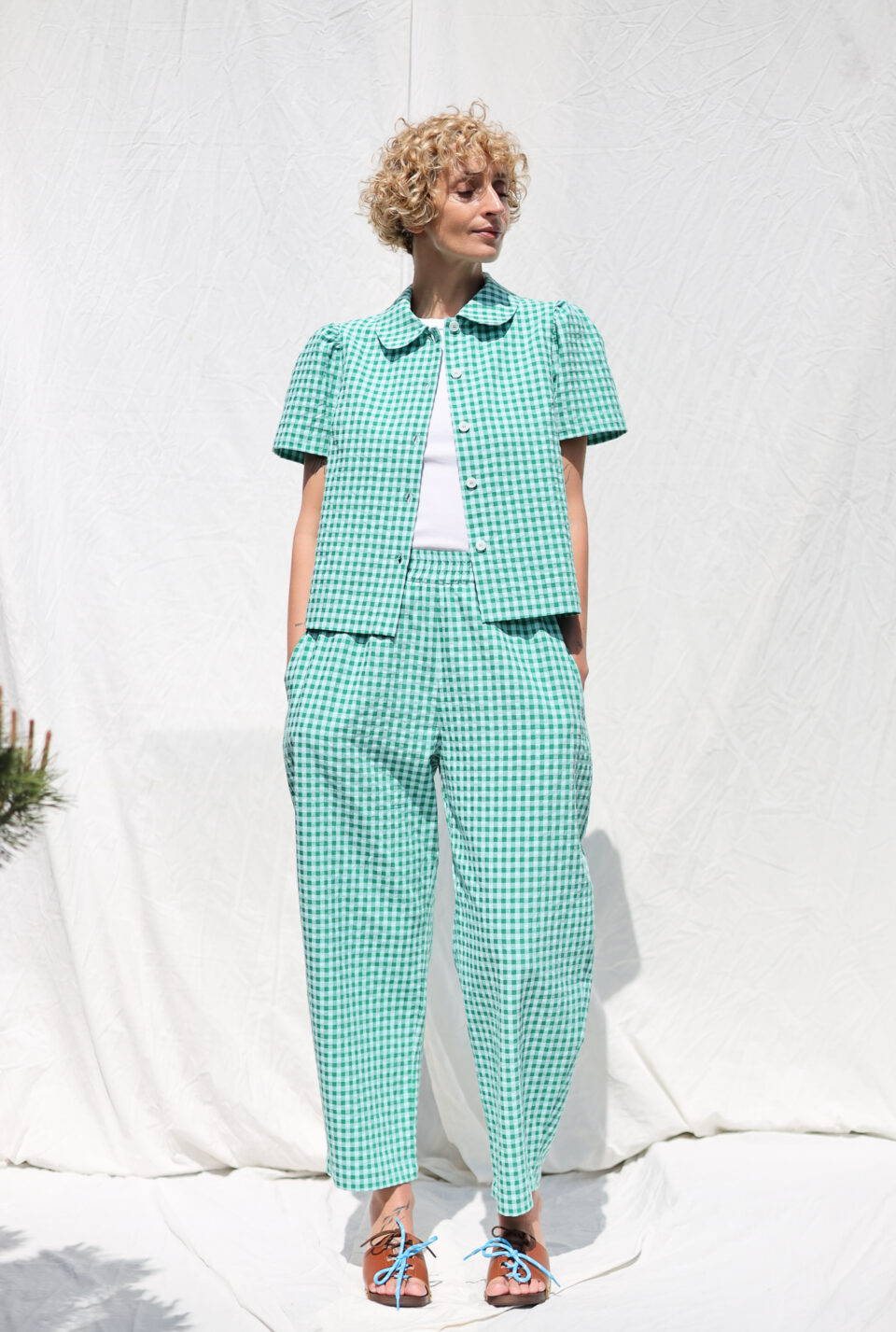 Peter Pan collar short sleeve blouse in jungle green seersucker checks - Image 1
