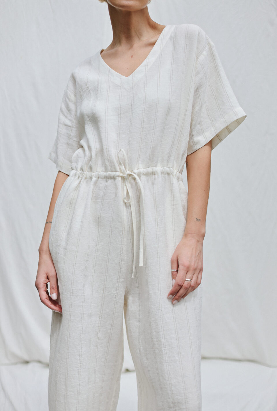 Linen V-neck Wide Legs Jumpsuit with Drawstring In Off-white Natural Stripes - Image 1