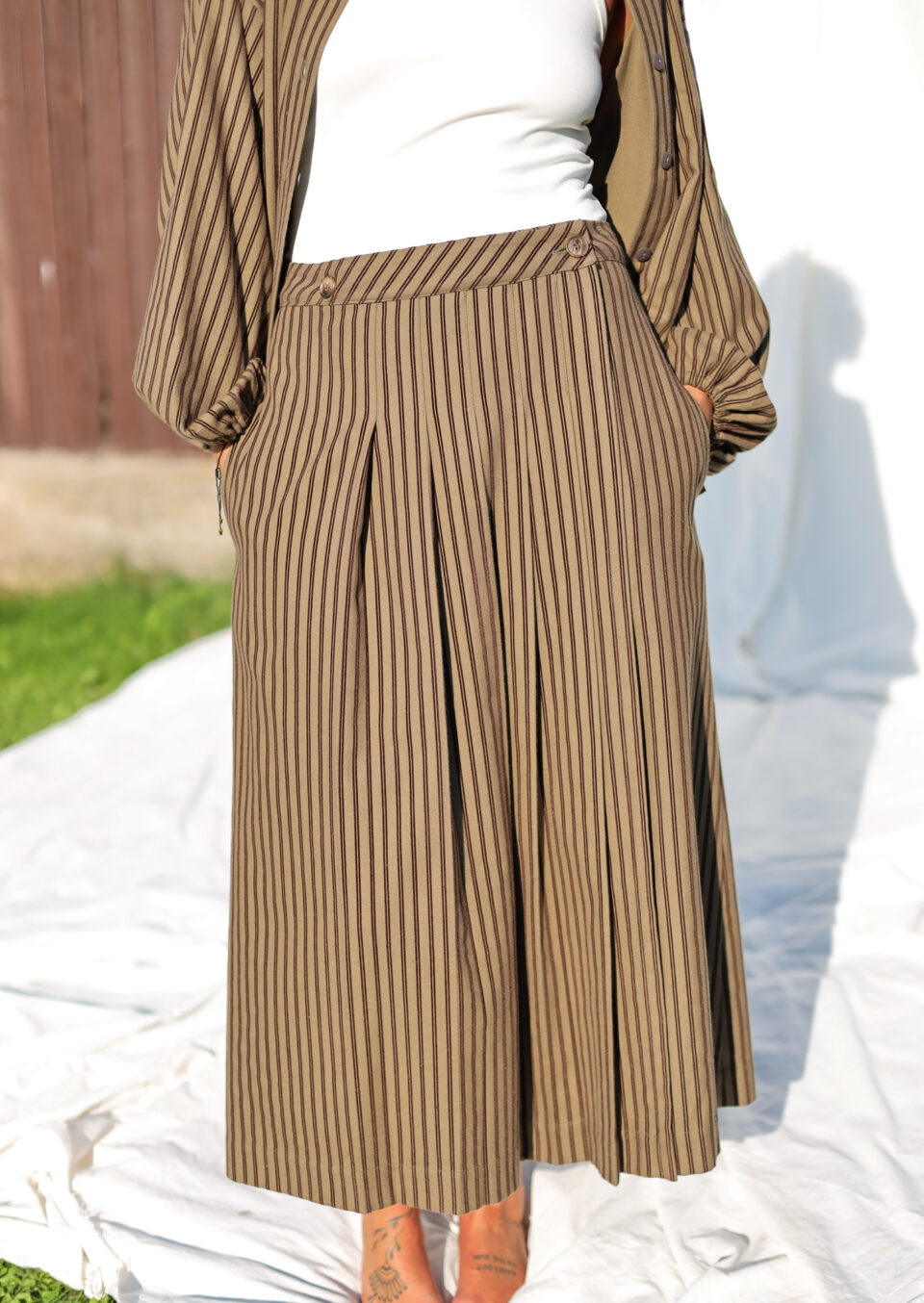Front pleated wrap skirt in khaki striped skirt - Image 2