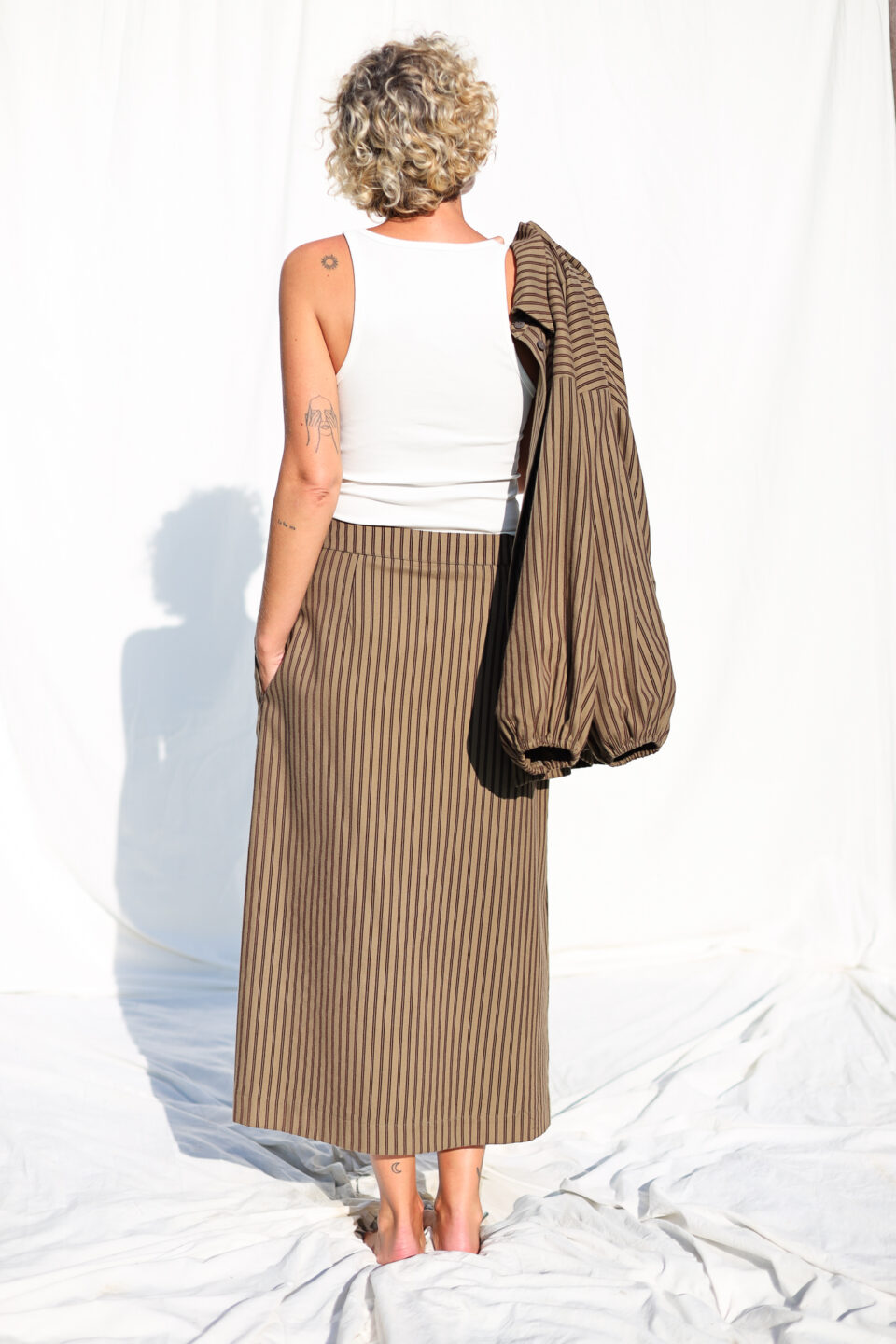 Front pleated wrap skirt in khaki striped skirt - Image 3