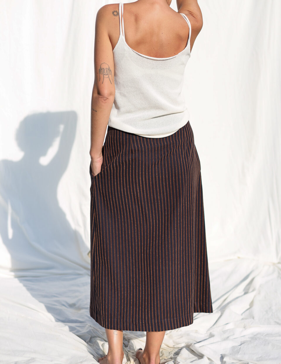Front pleated wrap skirt in velvety navy blue stripes - Image 4