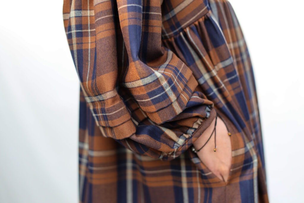Oversized Plaid Wool Dress with Pleated Details - Image 6