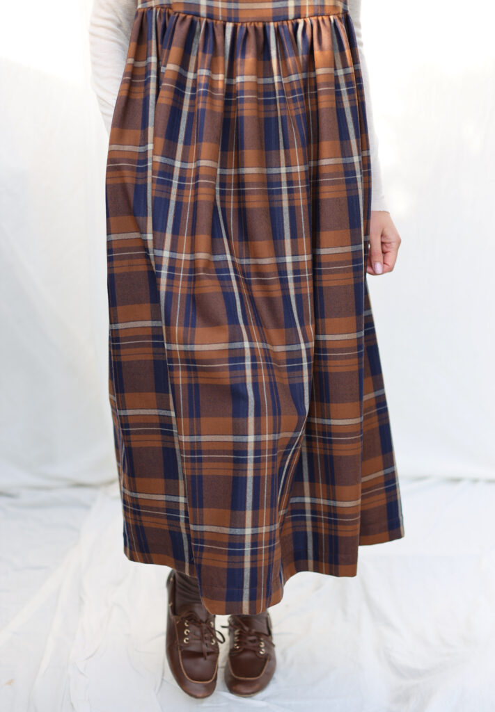 Plaid Wool Smock Dress with Ruffled Skirt - Image 1