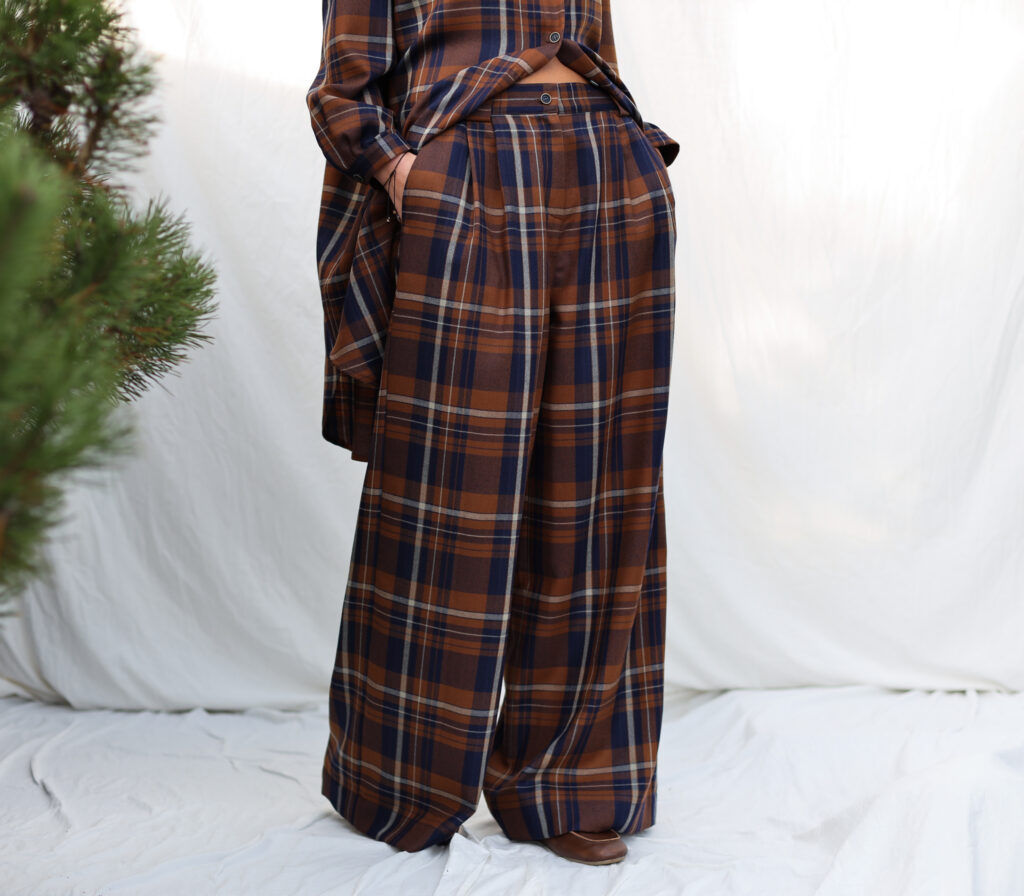 Pleated plaid wool palazzo trousers | Trousers | Sustainable clothing | OffOn clothing