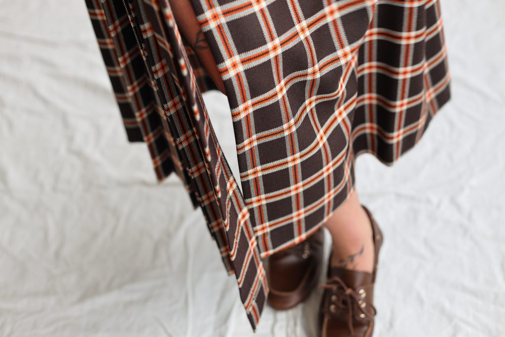 Front pleated wrap plaid skirt
